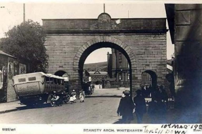 Long range view of hotel through archway
