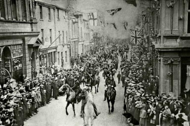 People on horses travelling through Whitehaven
